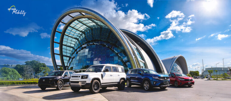ANSA Mobility vehicles outside a modern transport destination